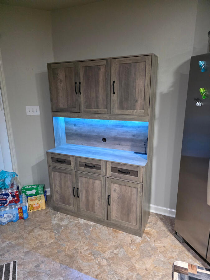 Entertainment cabinet assembled in place